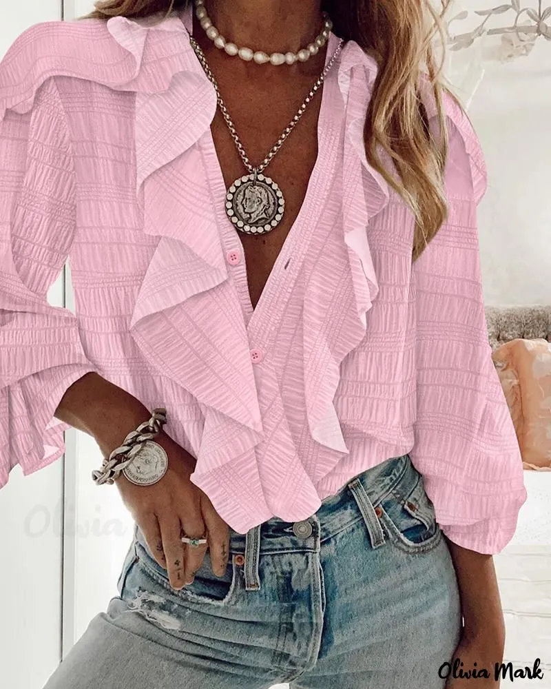 Deanwangkt - Textured Long Sleeve Blouse with Ruffled Hem